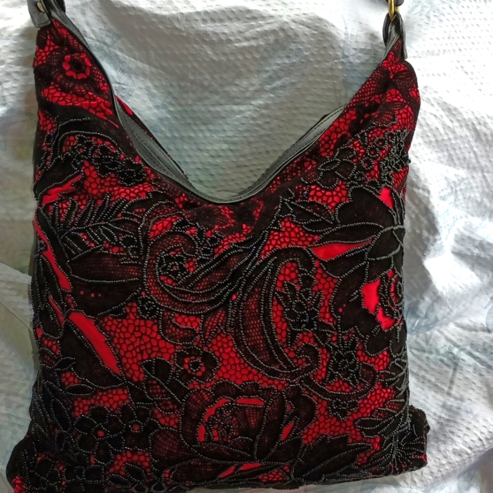 Beaded black and red shoulder bad